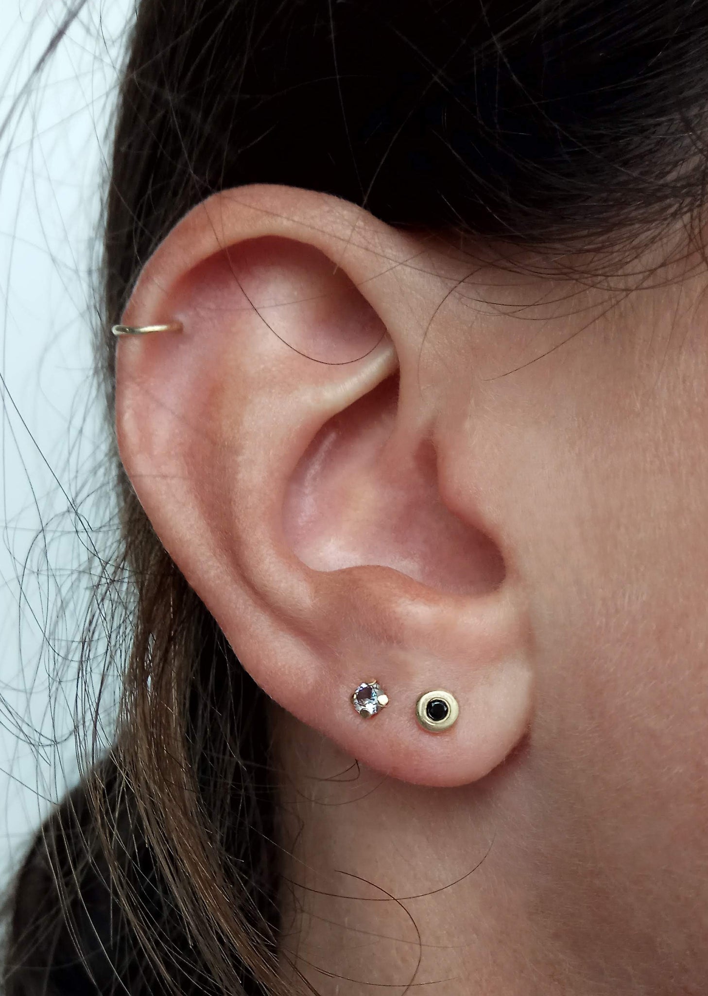 Black and gold stud earrings