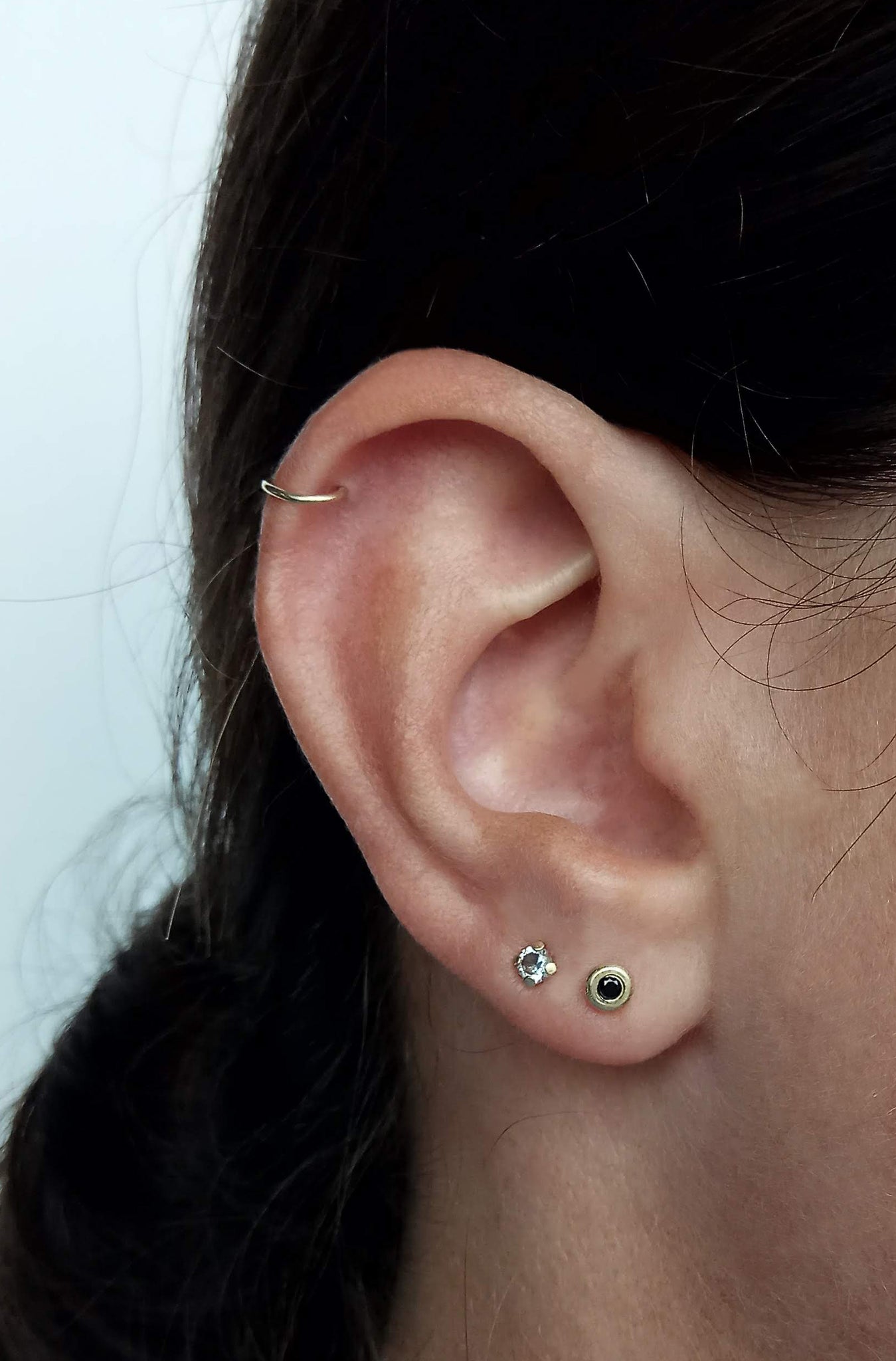 Black and gold stud earrings