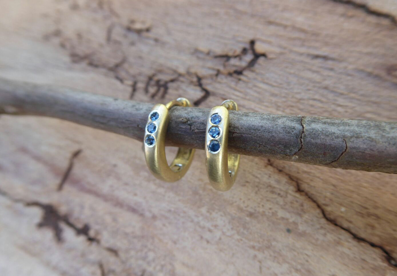 Gold hoop earrings with three sapphires - G Rubinstein Jewellery