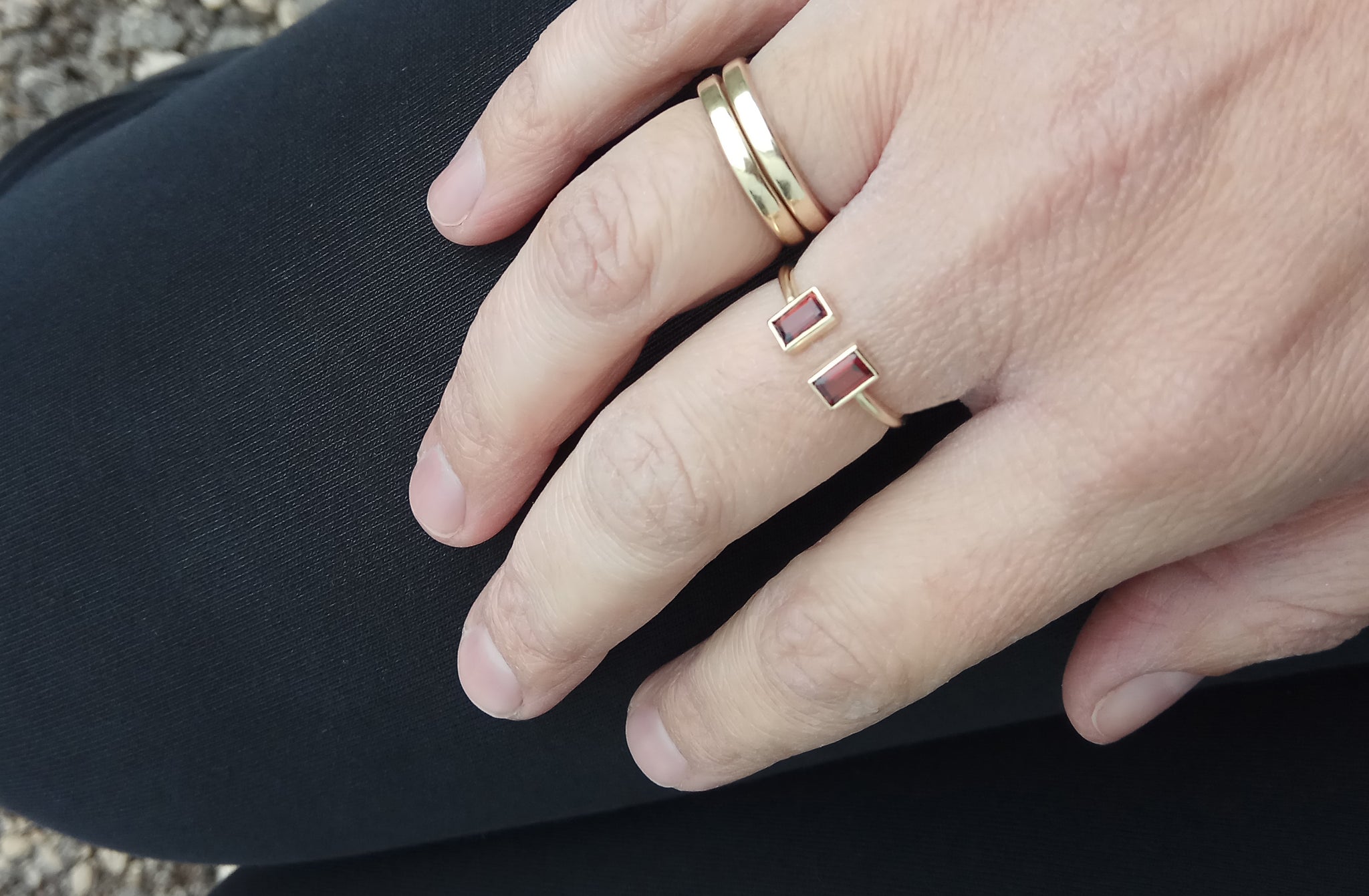 Open gold ring with two garnets - G Rubinstein Jewellery