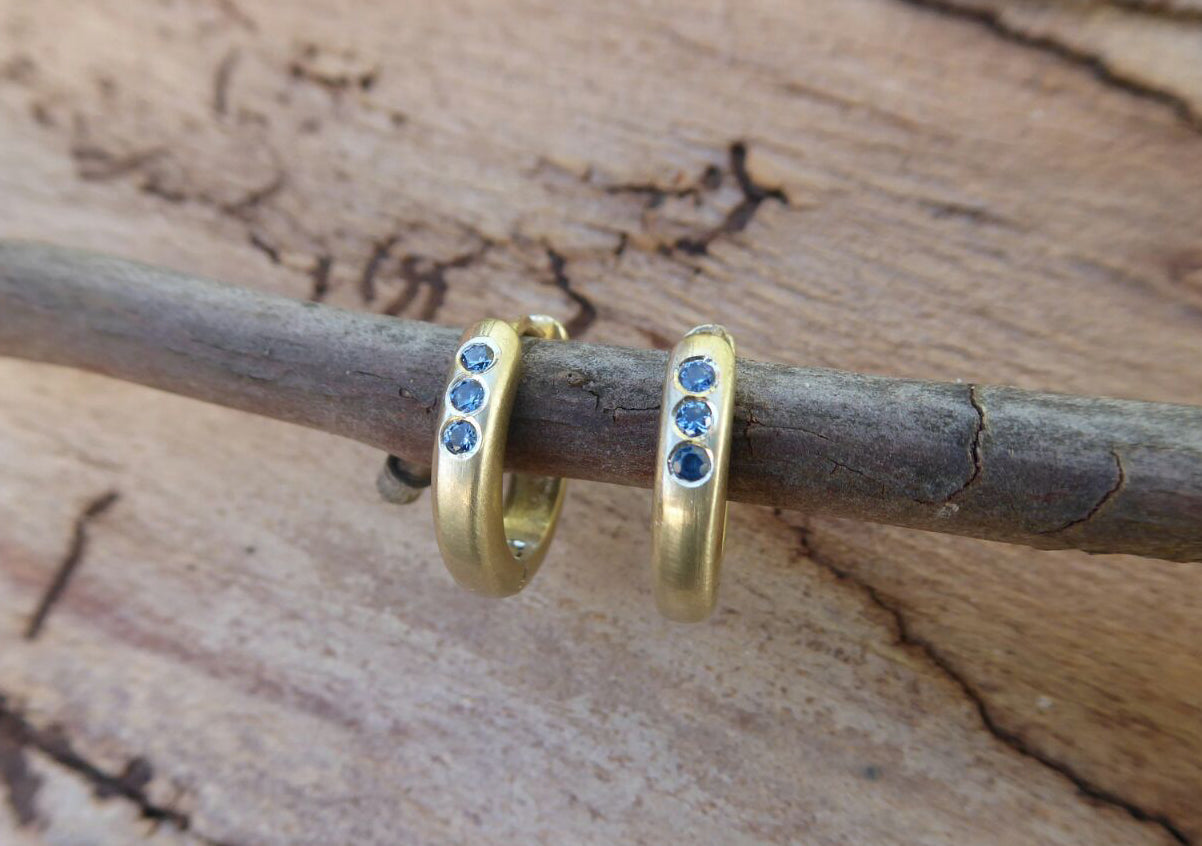 Gold hoop earrings with three sapphires - G Rubinstein Jewellery